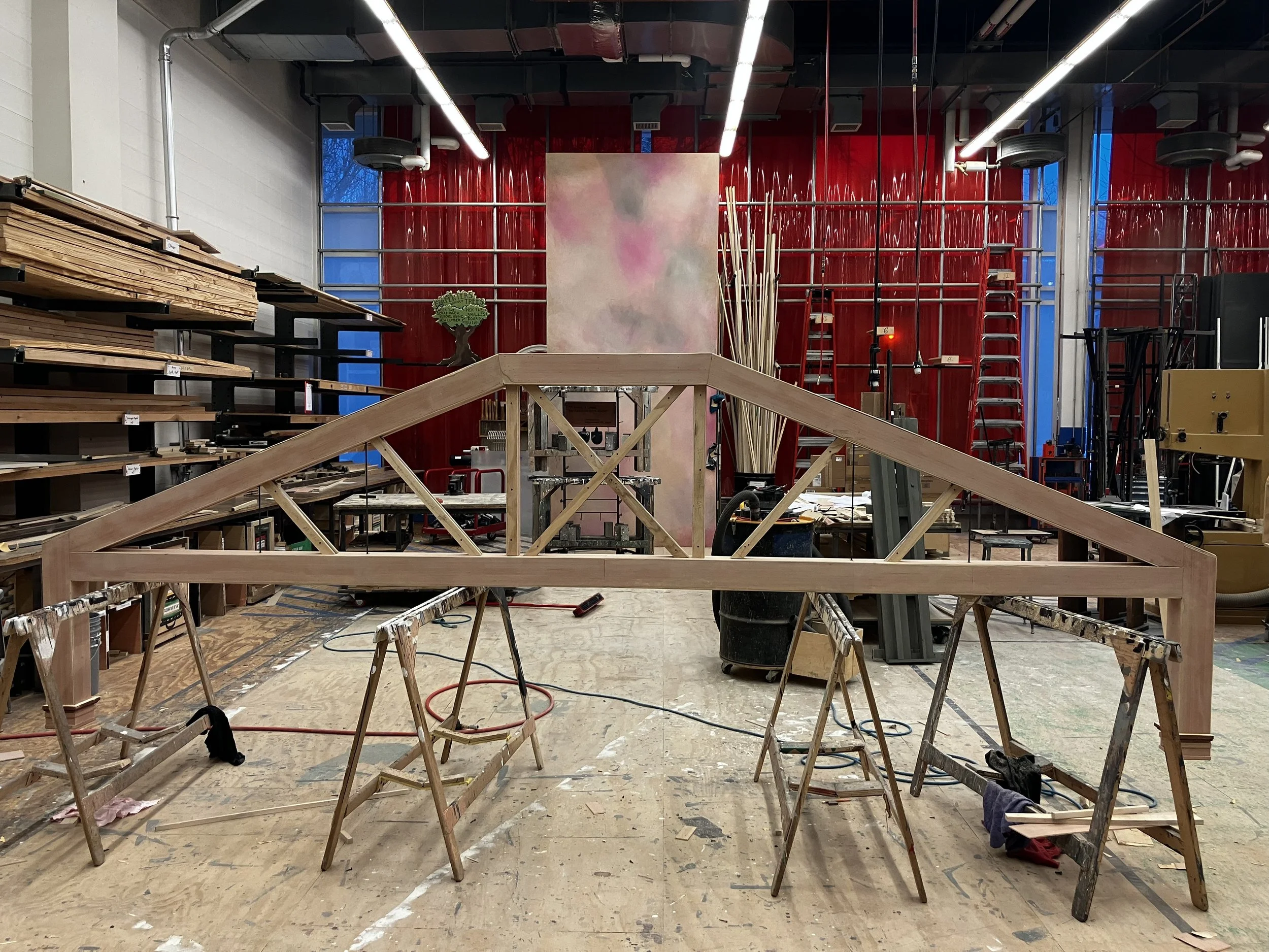 Rafter before paint with projection screen in background