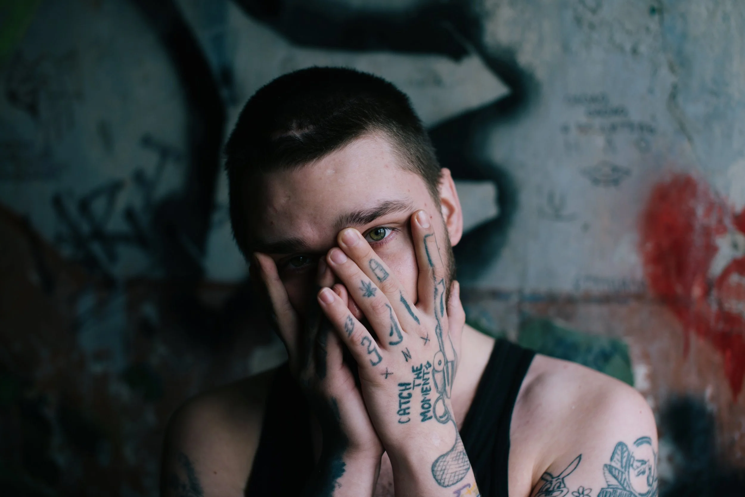 Portrait of tattooed young man in post-Soviet Russia. Photograph by Semyon Kokorin featured in “Semyon’s World,” an essay by Timofey Abel.
