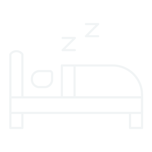 A simplified white line drawing of a bed with a person sleeping, represented by a circle for a head, and a 'Z' indicating sleep, on a black background.