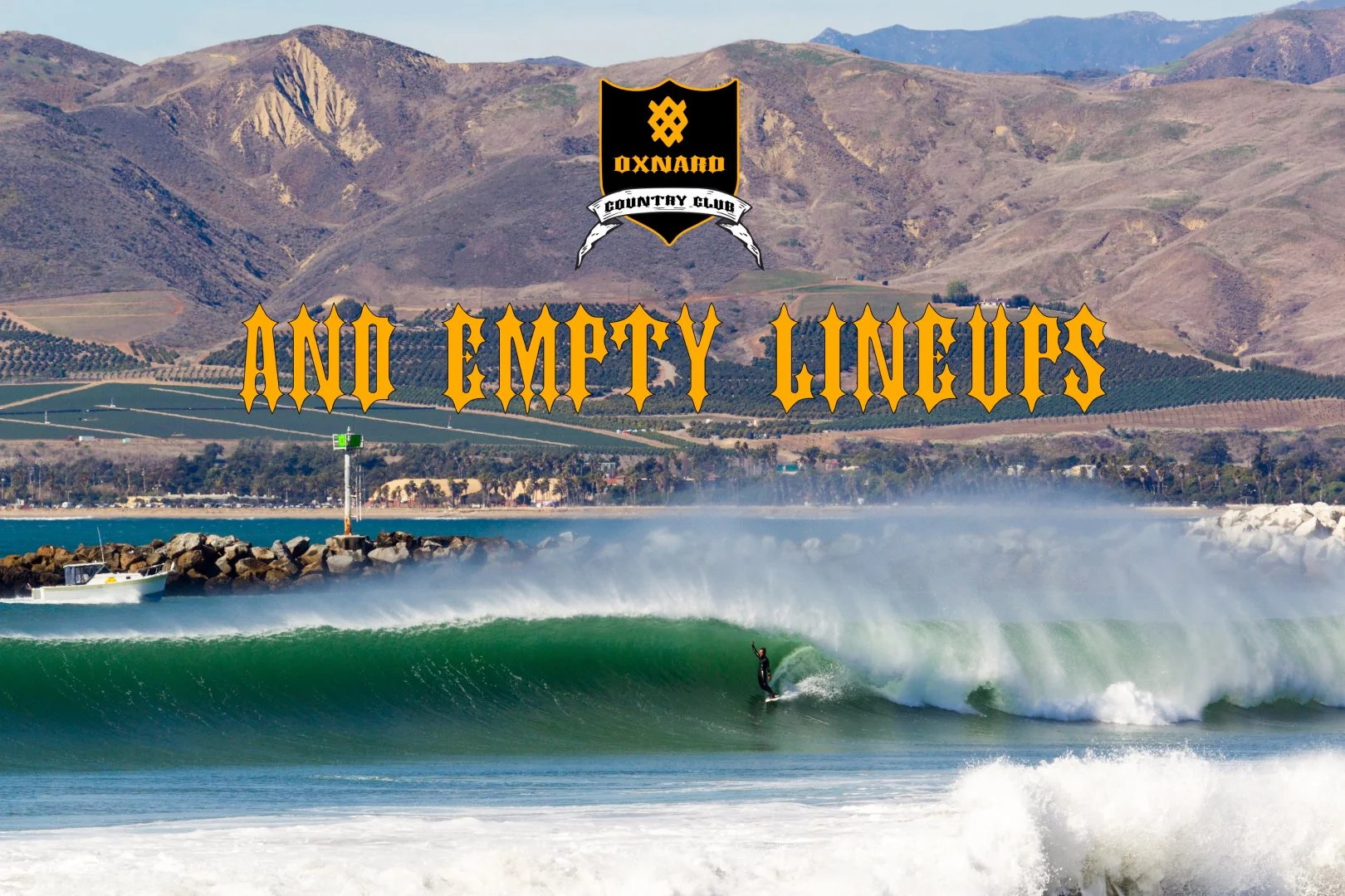 A surfer riding a wave at a beach with mountains in the background. Text overlay says 'And Empty Lineups' and a logo for Oxnard Country Club with a black and yellow crest.