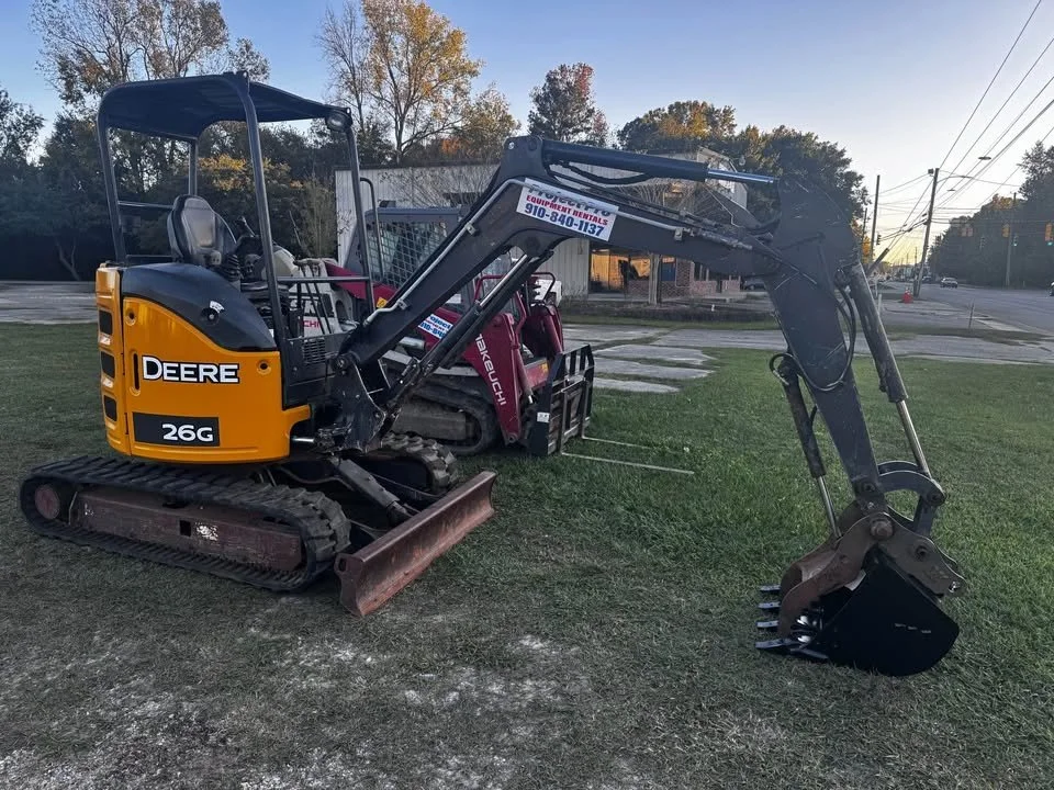 John Deere 26G mini excavator for rent.  Call Project Pro Rental at 910-840-1137