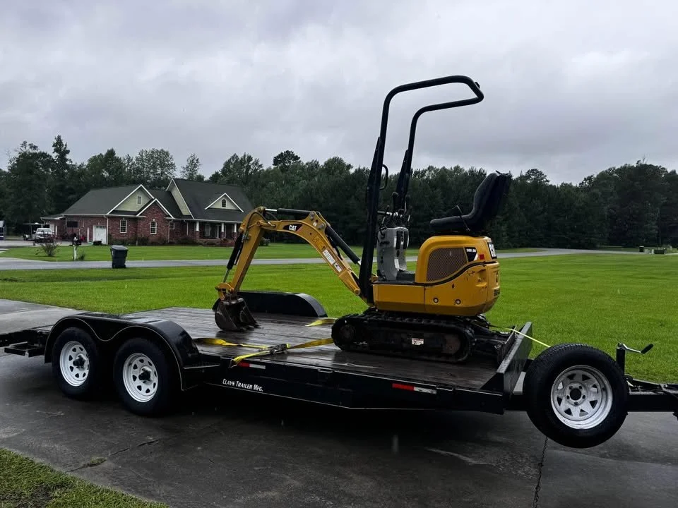 CAT 300.9D mini excavator for rent.  Call Project Pro Rental at 910-840-1137