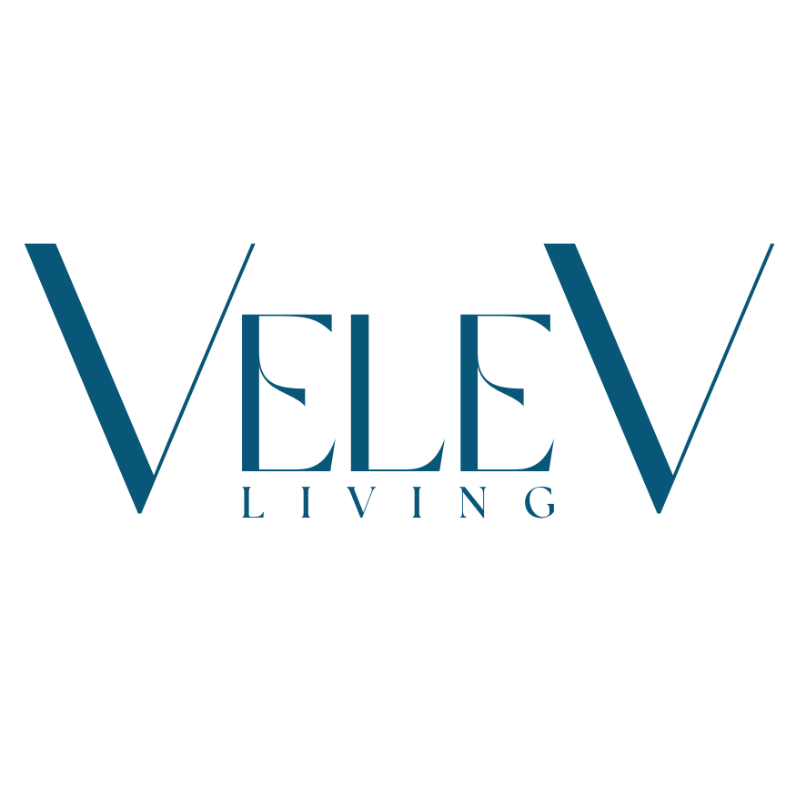 Logo for Vele Living with stylized large 'V' on left and right, and 'ELE LIVING' in the center.