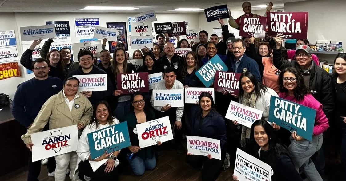 Supporters holding Patty García signs
