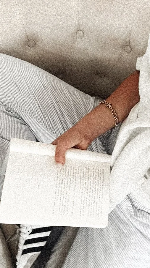 A woman reads a book