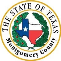 Seal of Montgomery County, Texas, featuring the Texas state outline, laurel leaves, and a gold border.