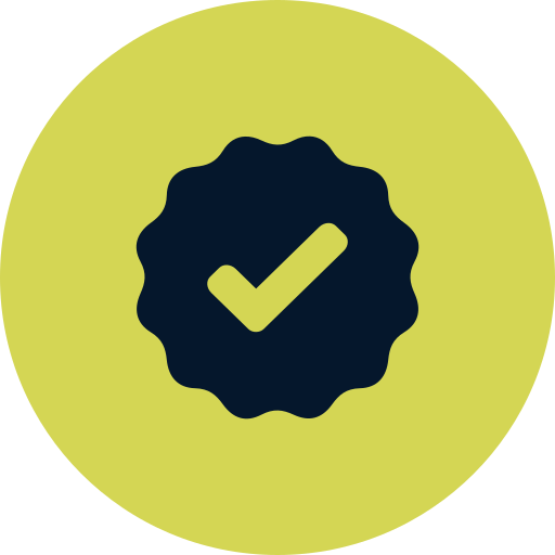 Green circular badge with a dark blue checkmark inside a scalloped edge circle in the center