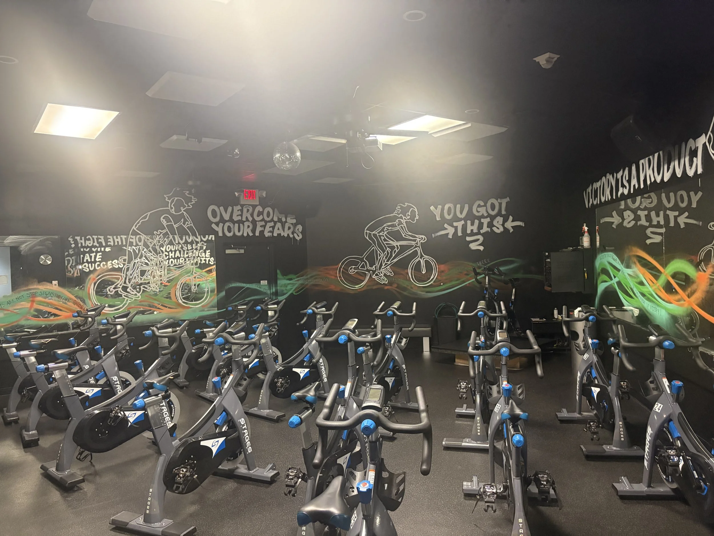  
   CYCLE 
   Clip in for a motivating ride in our black-lit cycle room. This ride delivers endurance, power, and a euphoric rush that keeps you coming back. 
 