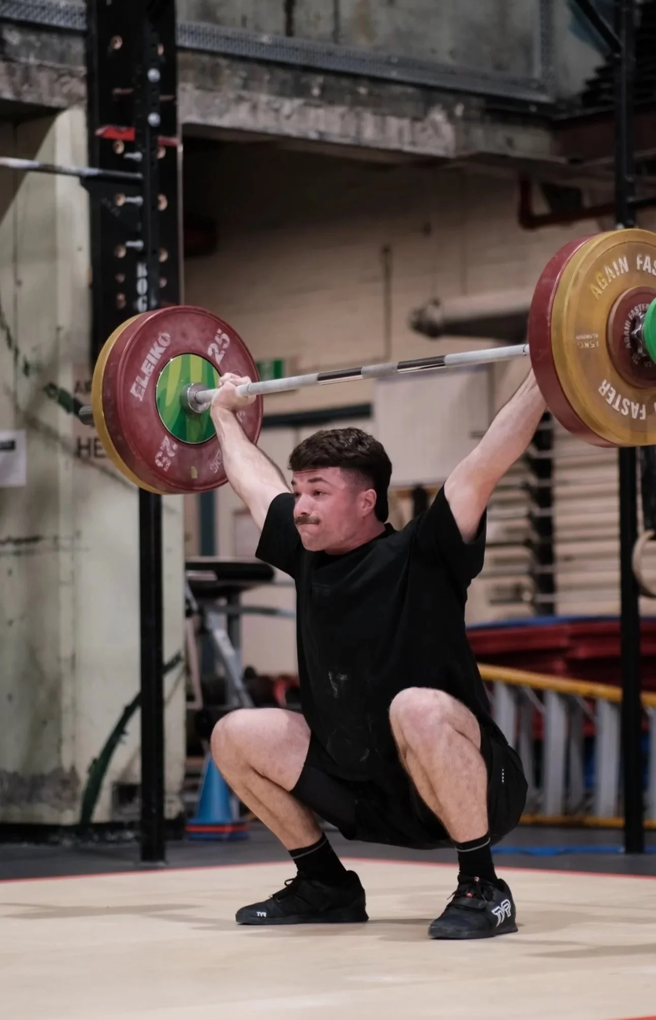 Sports Chiropractor Lifting Weights 