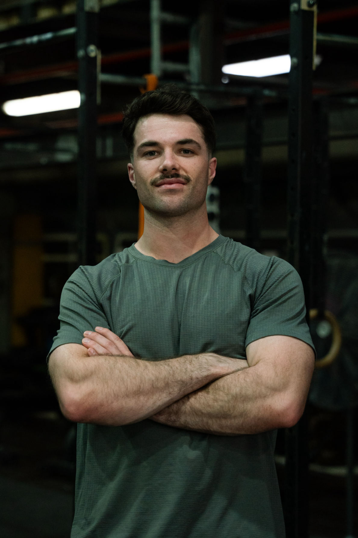 One Sports Chiropractor Smiling in his South Brisbane Rehab Facility