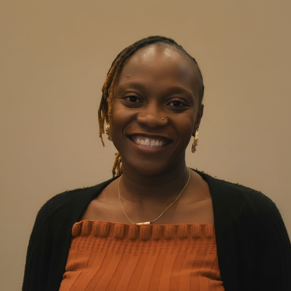 Abstract pattern of black semicircles and quarter circles on a beige background.