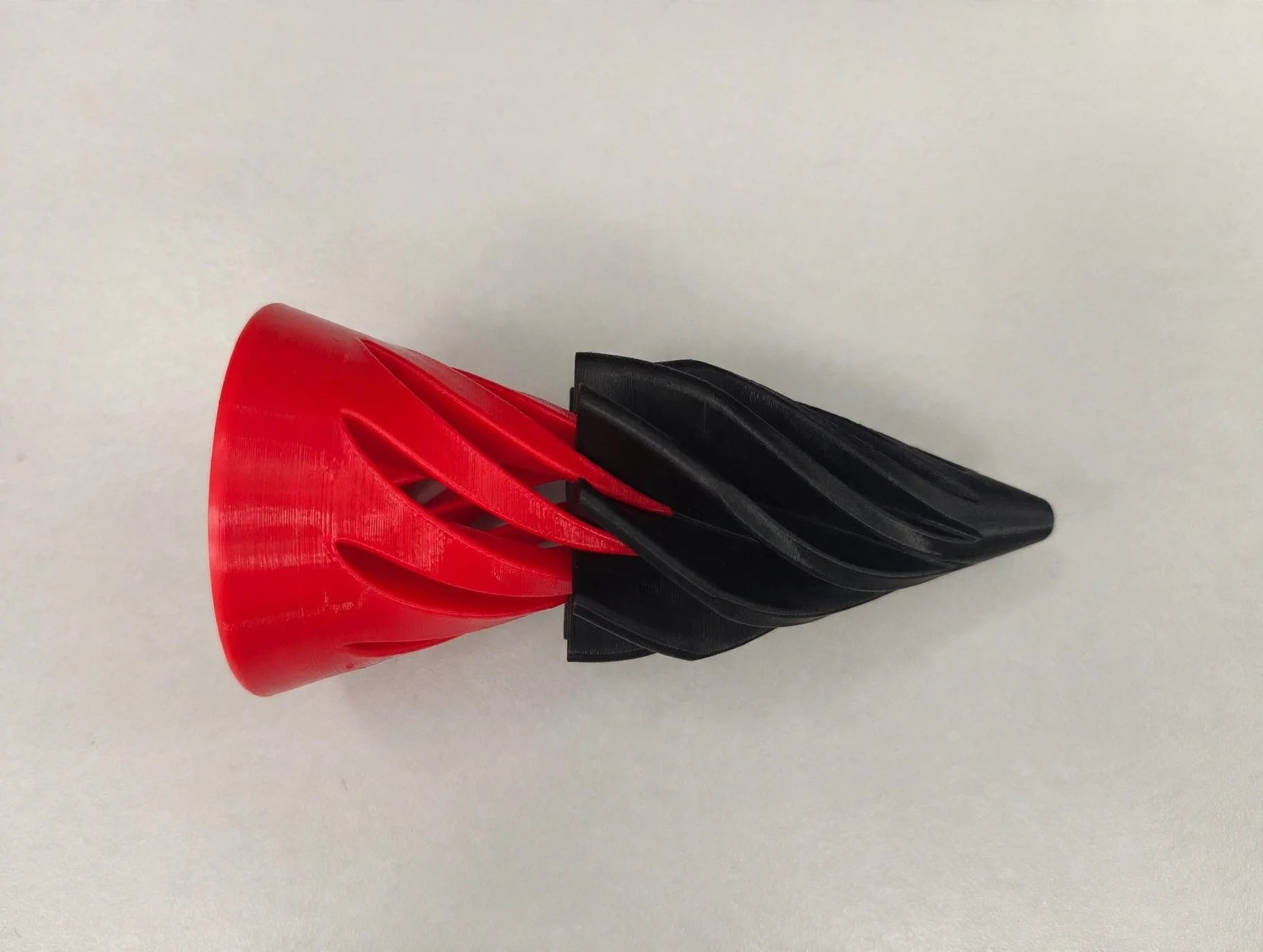 media-generation-spiral-cone-twotone-red-black-0-02804475-e33c-4a73-8b27-6b481e9062f4.webp