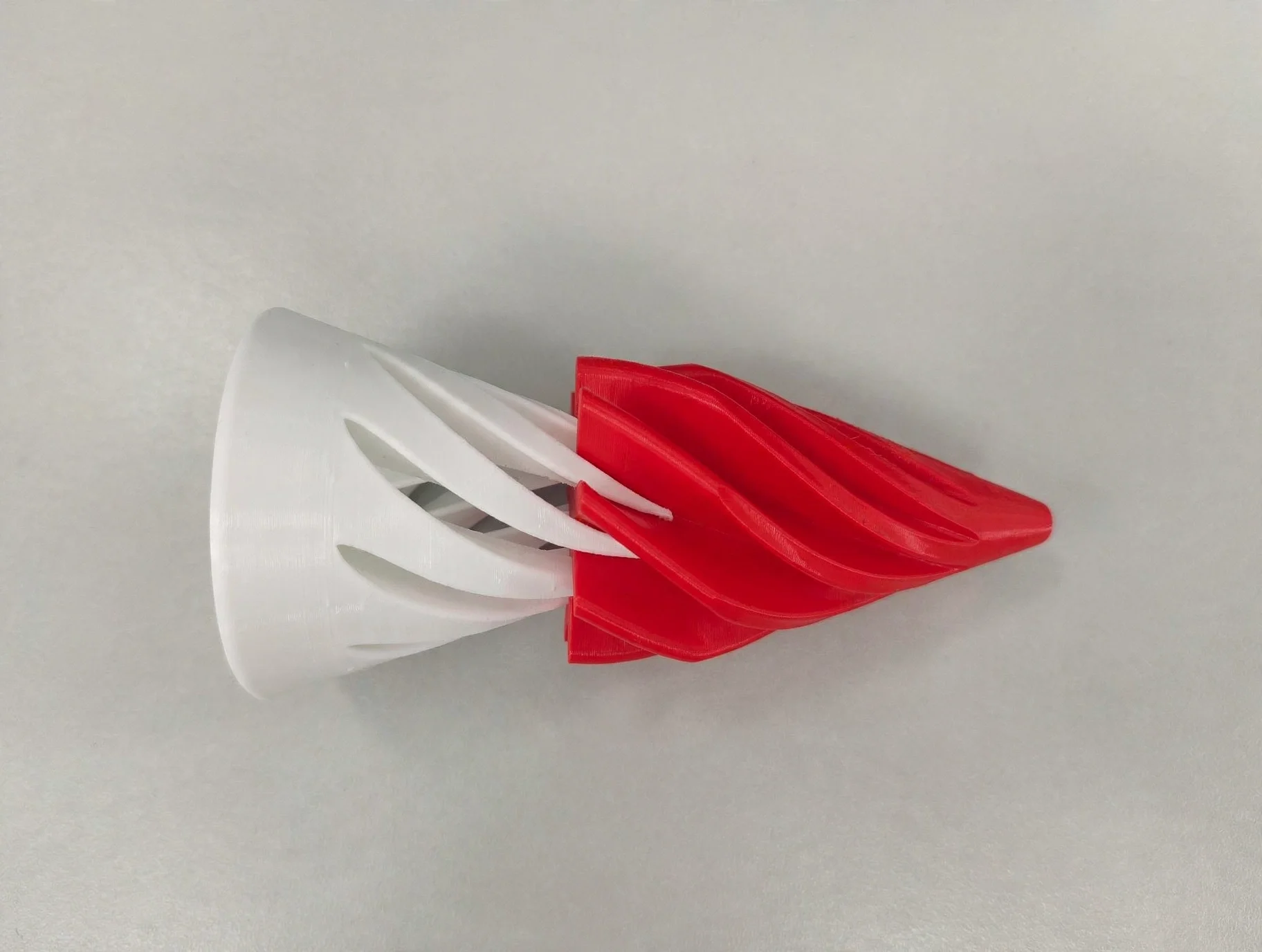 media-generation-spiral-cone-twotone-white-red-0-04466e4a-2614-4cae-bf8d-a05baf7470f7.webp