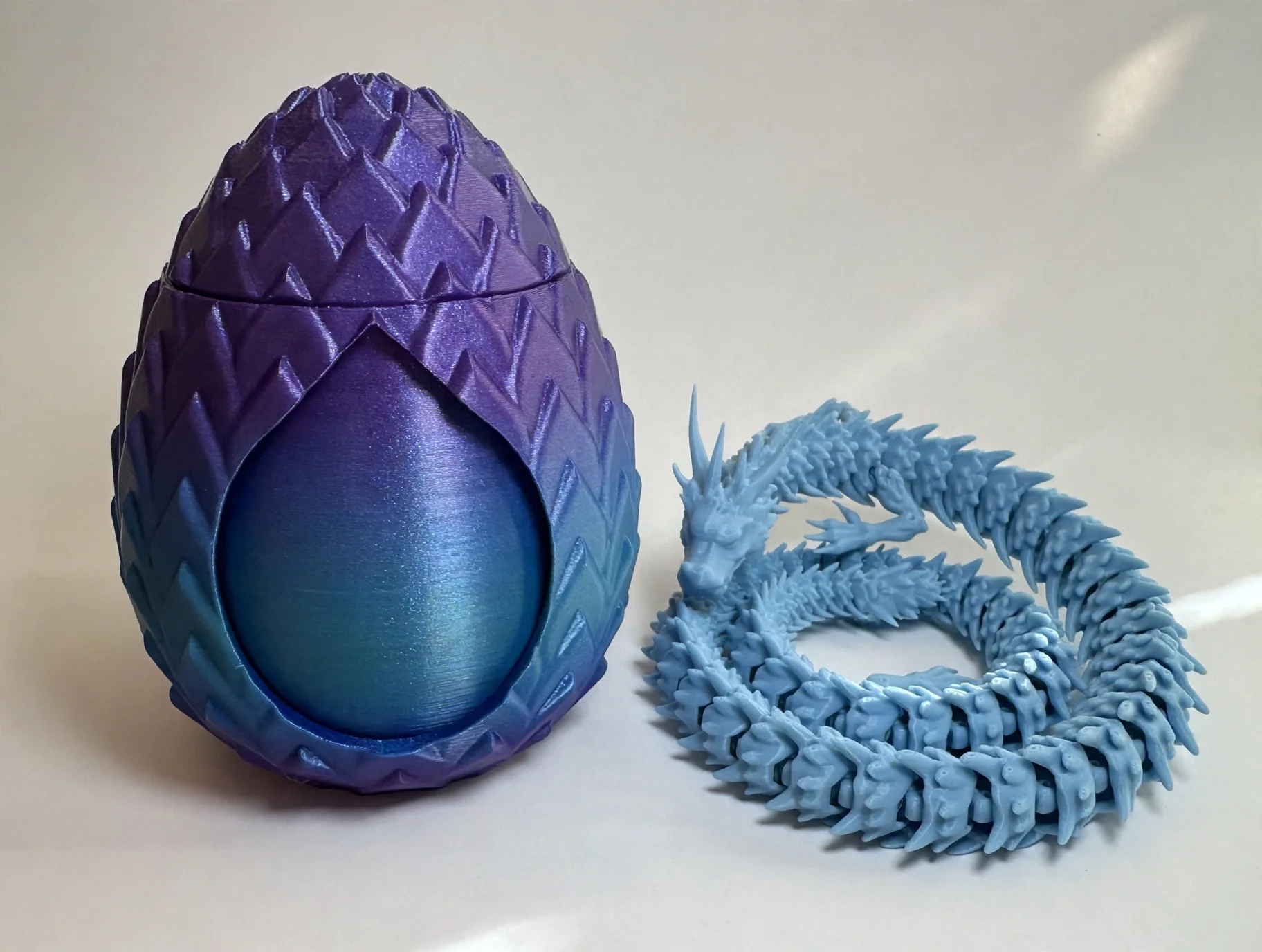 media-generation-dragon-egg-white-dragon-blueha-0-e288fcf2-887e-41d3-9569-b5be03eb6554.webp