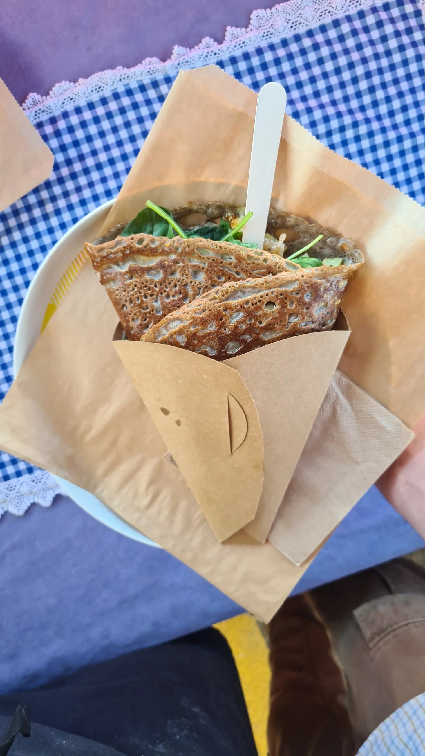 Savoury filled folded crepe in portable cardboard packaging