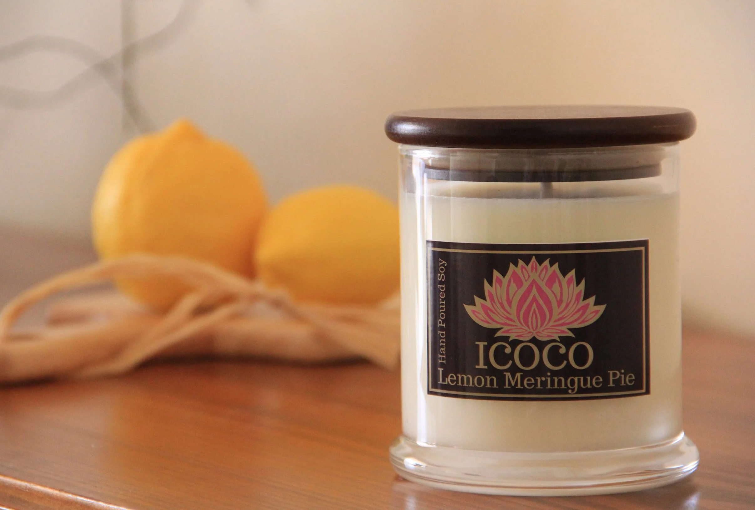 ICOCO glass jar candle with lemons in background