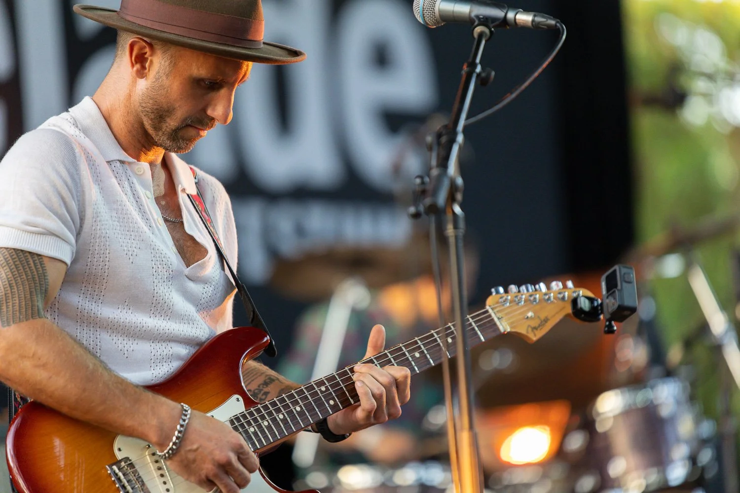 Dojo Rise guitarist performing on stage