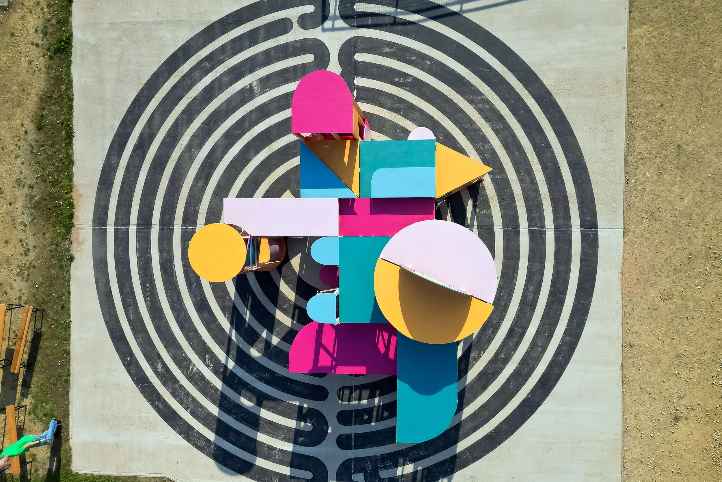 Free Form — Maze-like pavilion for playful exploration.