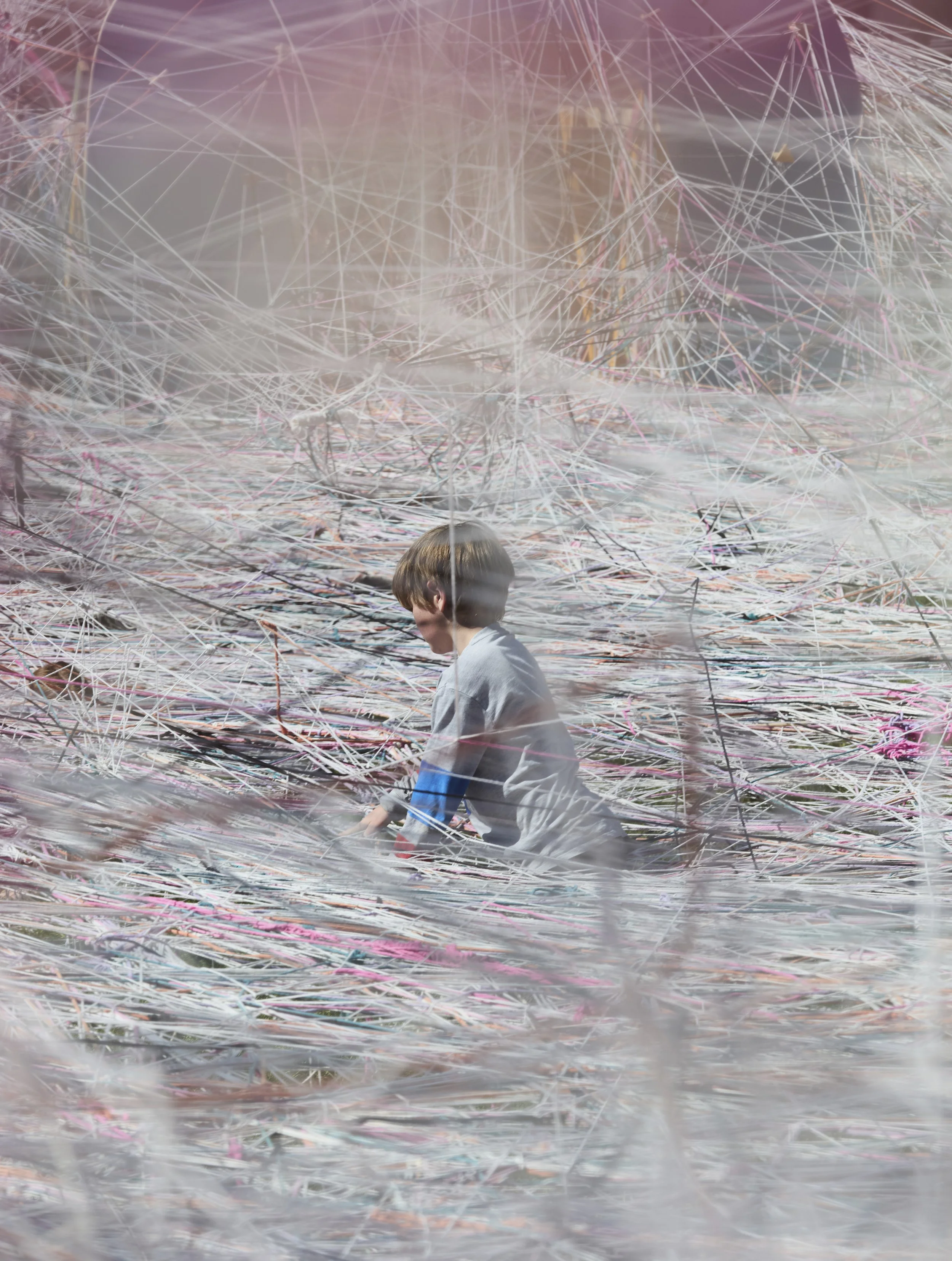 100 Miles of String — Participants weave colourful immersive environments.