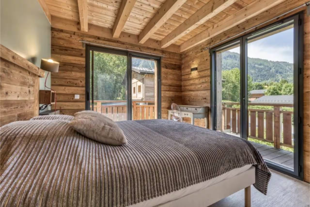 Chalet bedroom opening onto the terrace