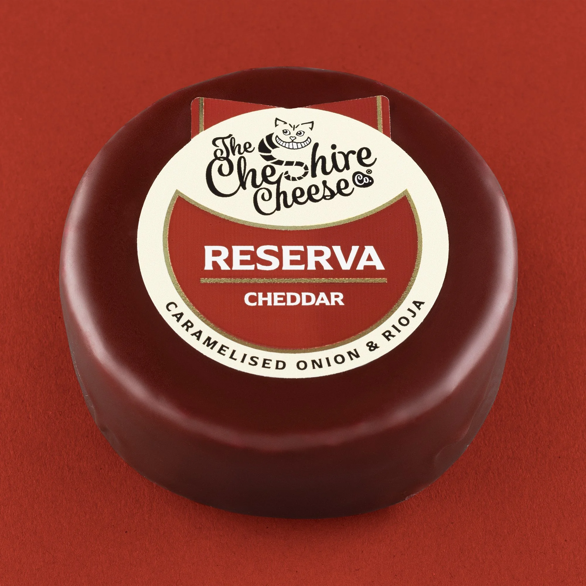 Reserva - Caramelised Onion & Rioja Cheddar Cheese - Waxed Truckle 200g