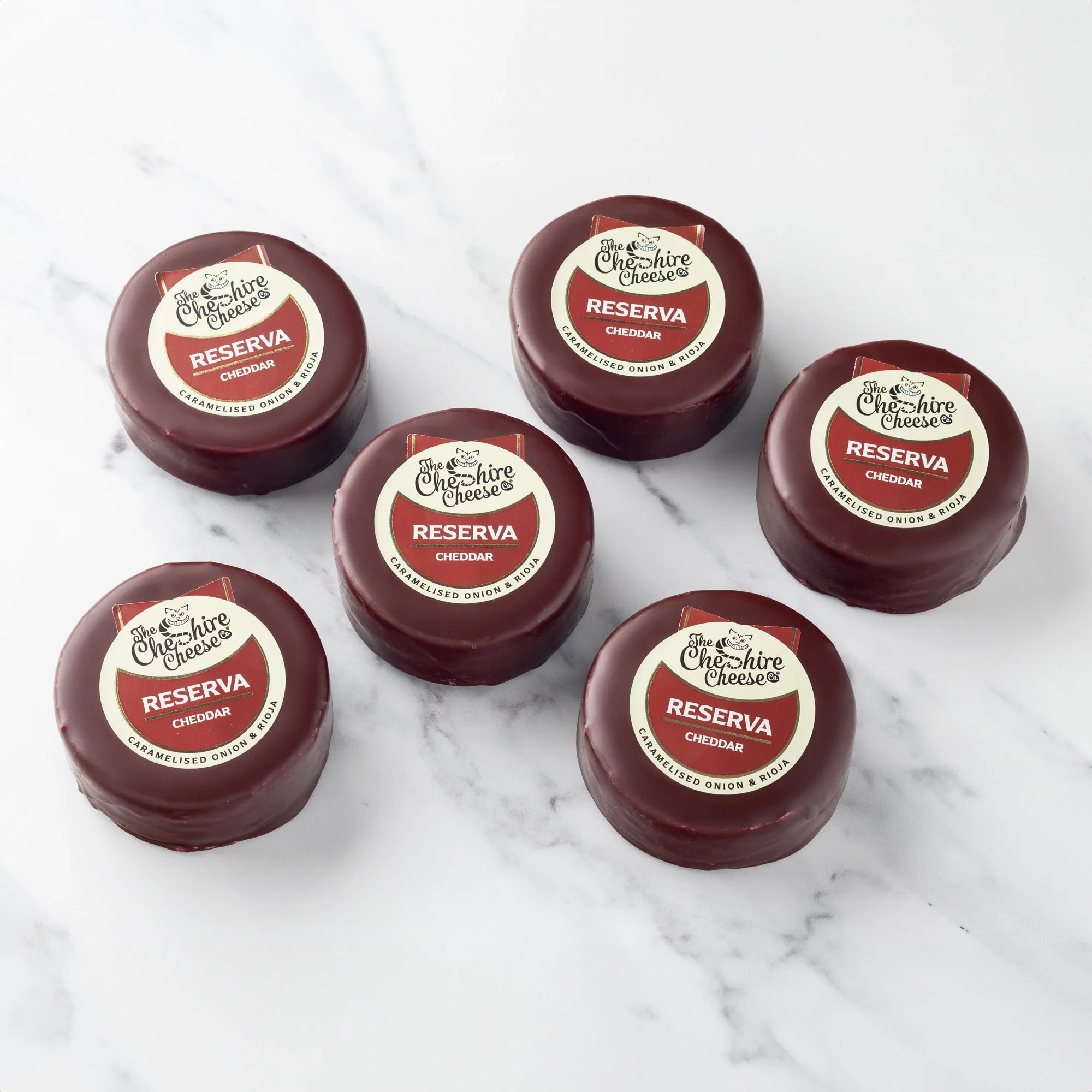 Reserva - Caramelised Onion & Rioja Cheddar Cheese - Waxed Truckle 200g