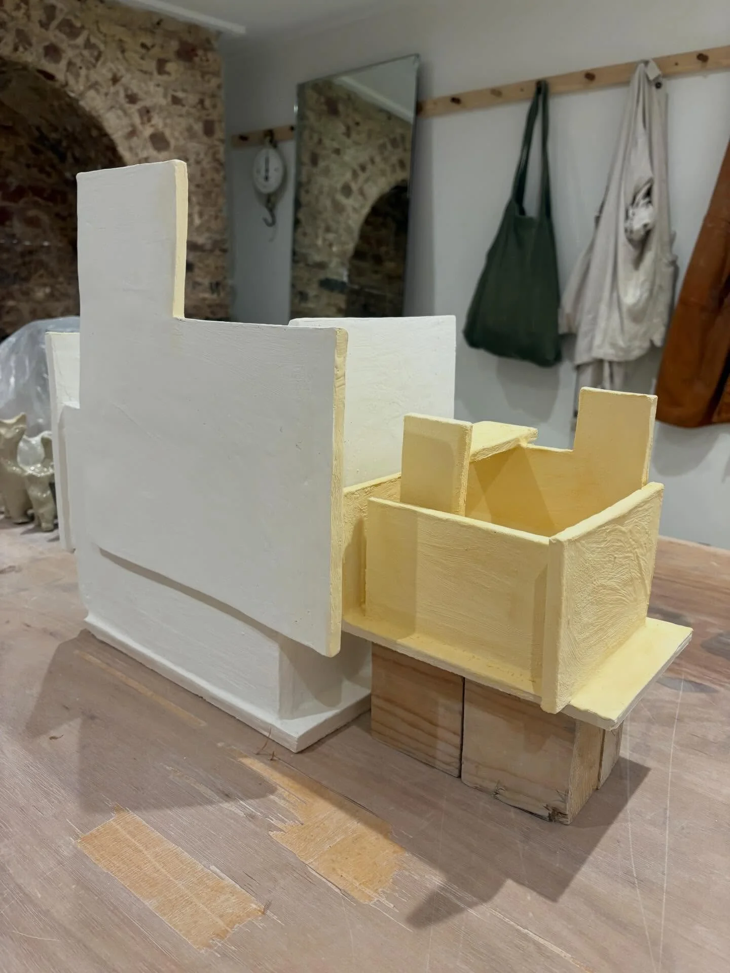 Two pieces, named A4 and A5, glazed today in tin white (a safe bet) and carnelian yellow (a first).