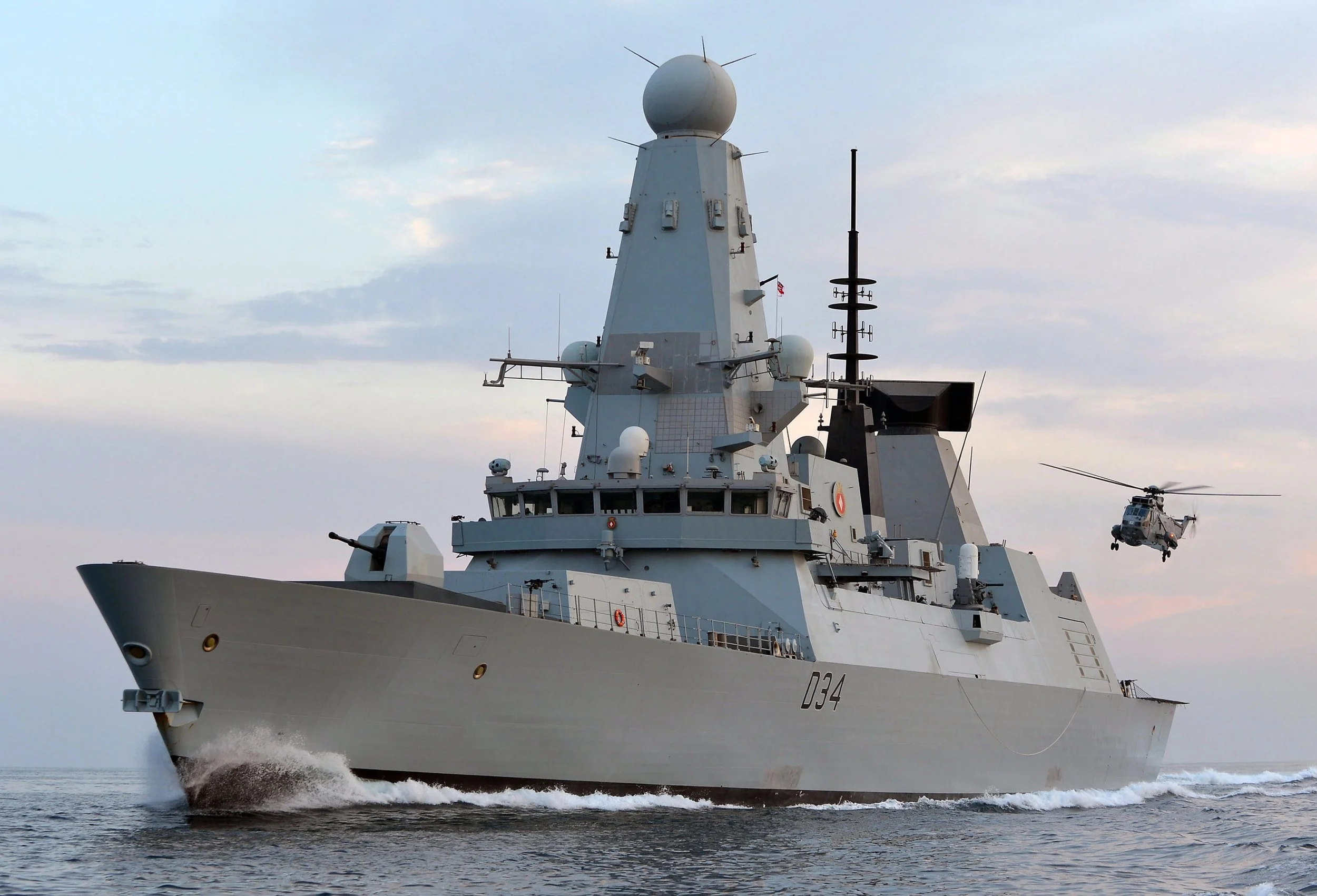 Grey warship at sea, HMS Diamond