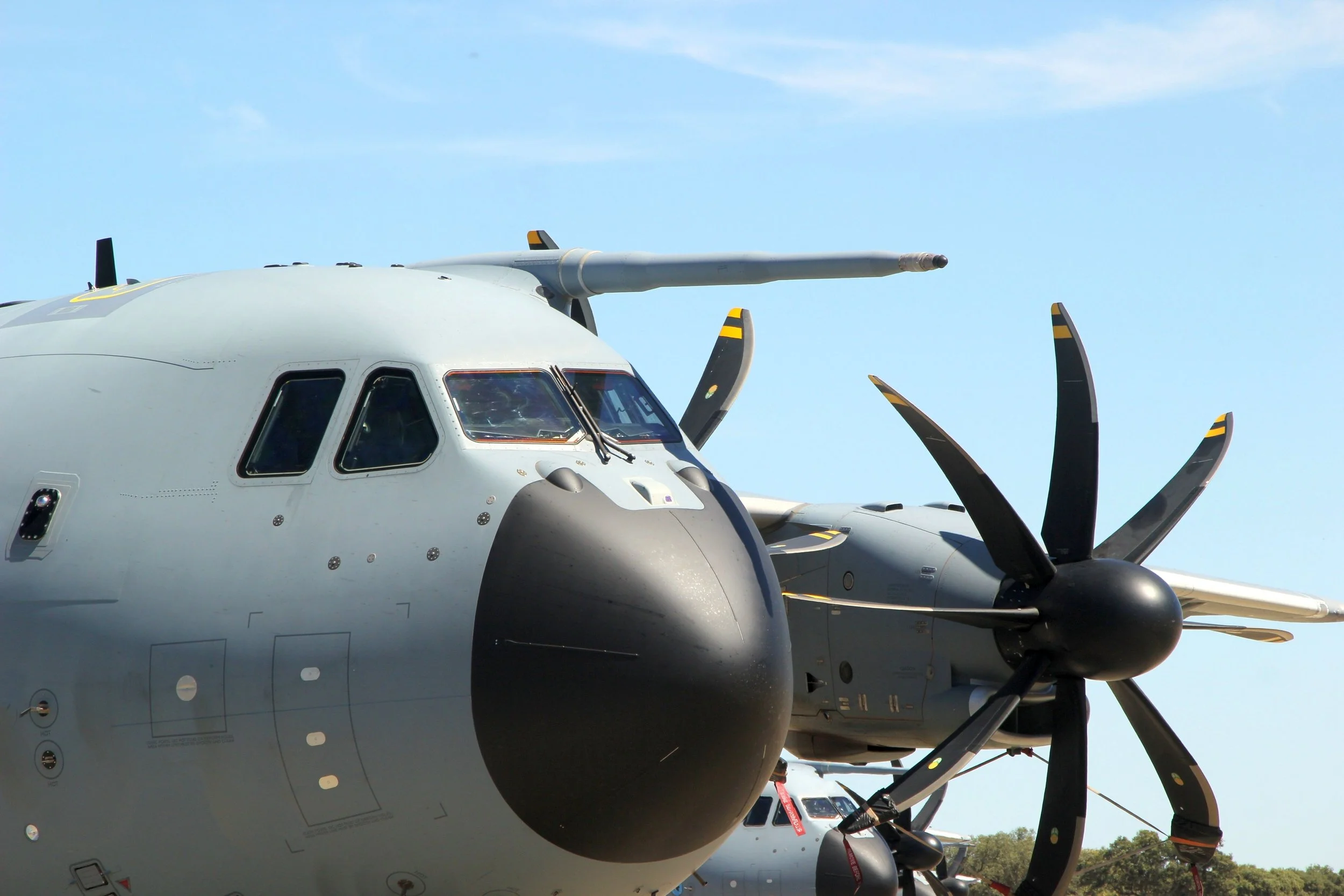 Close up of the front of a plane, with propellor/wing detail