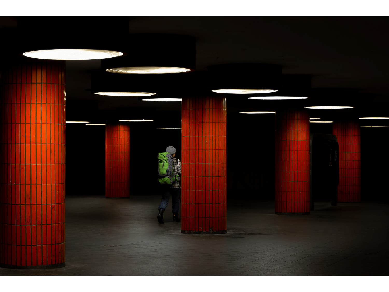 Transit Beneath Crimson