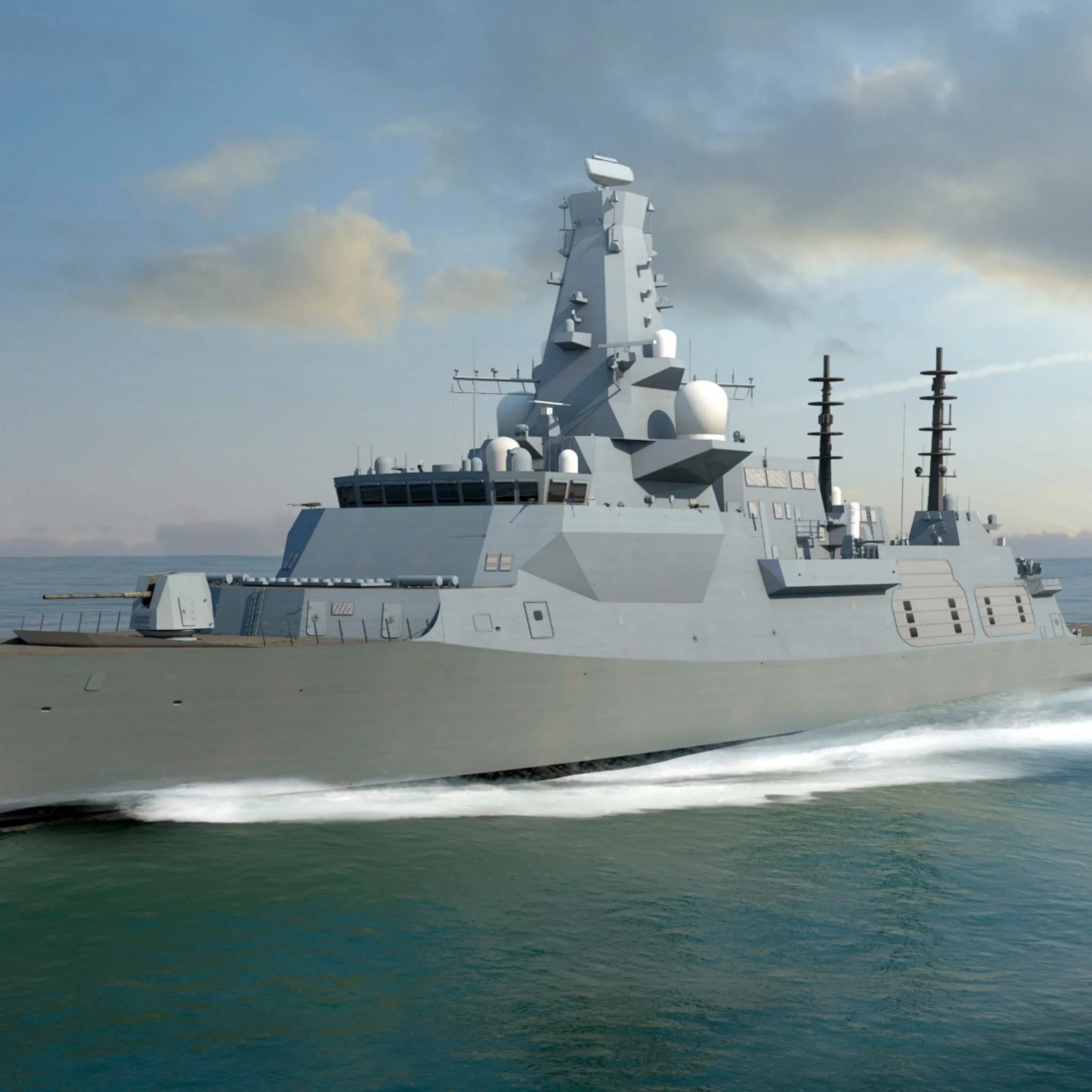 A modern gray naval warship sailing on the ocean with a cloudy sky in the background.