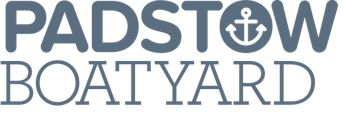 Logo for Padstow Boatyard with navy blue text and an anchor symbol.