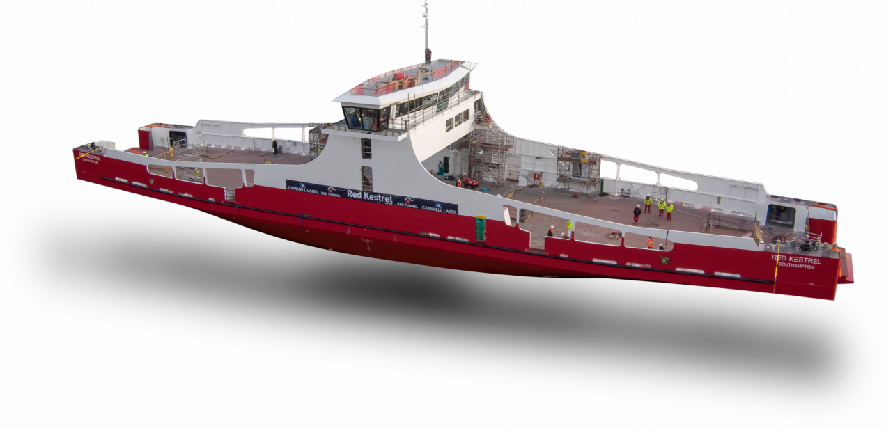 A ship under construction with scaffolding and workers on deck, painted white and red with the words "Red Kestrel" and "Southampton" on its side.