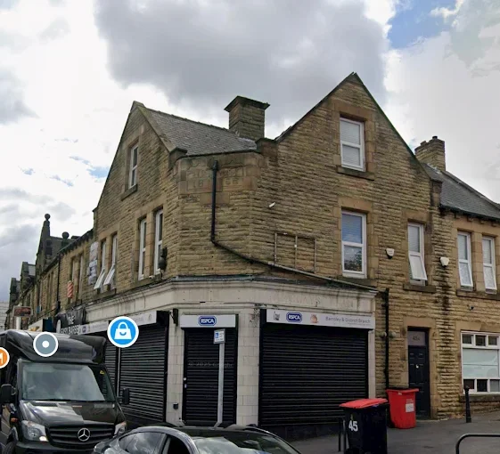 old bank house exterior.webp