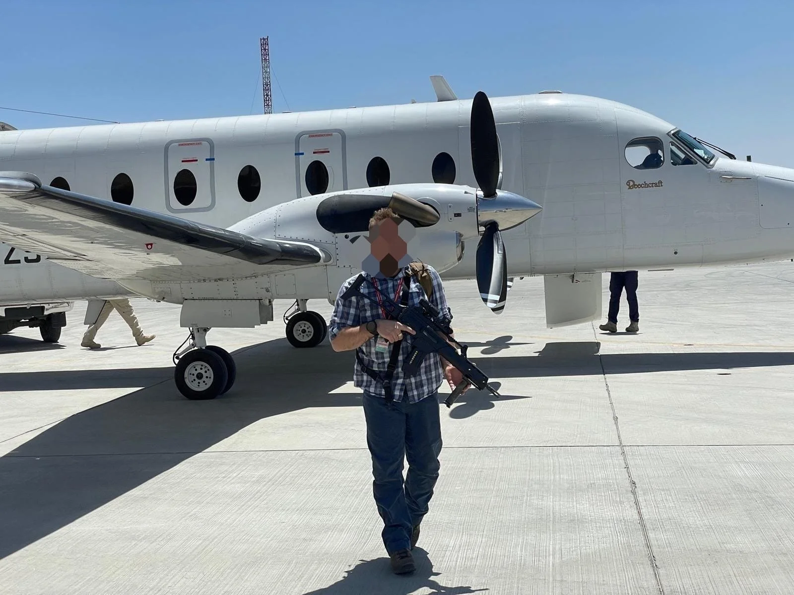 close protection operative on airfield