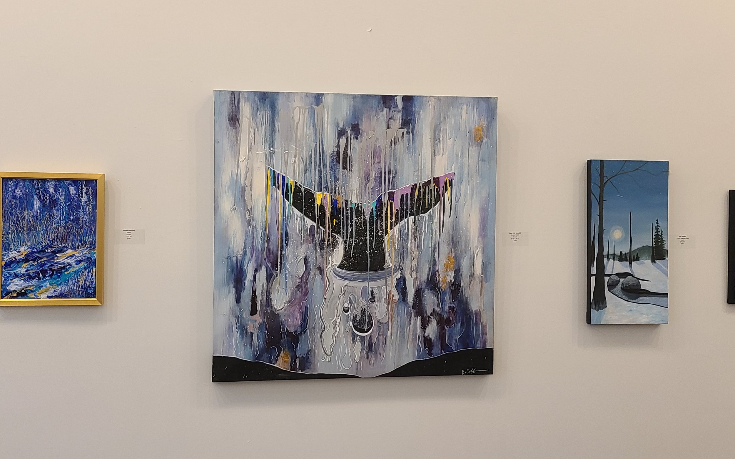 Abstract painting of a butterfly with wings spread, in dark colors with vibrant accents, dripping paint, and a textured background.