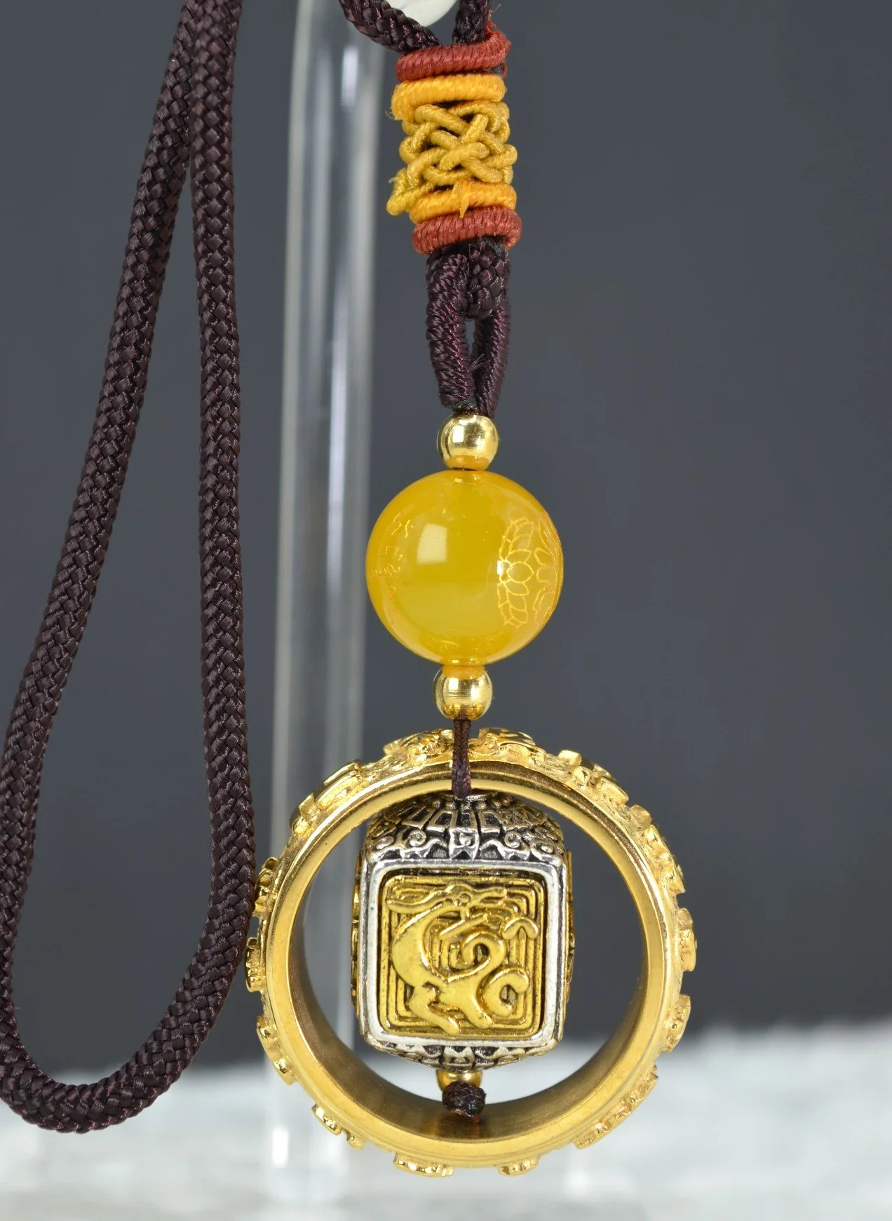 Harmony-Infused Yellow Mantra Charm