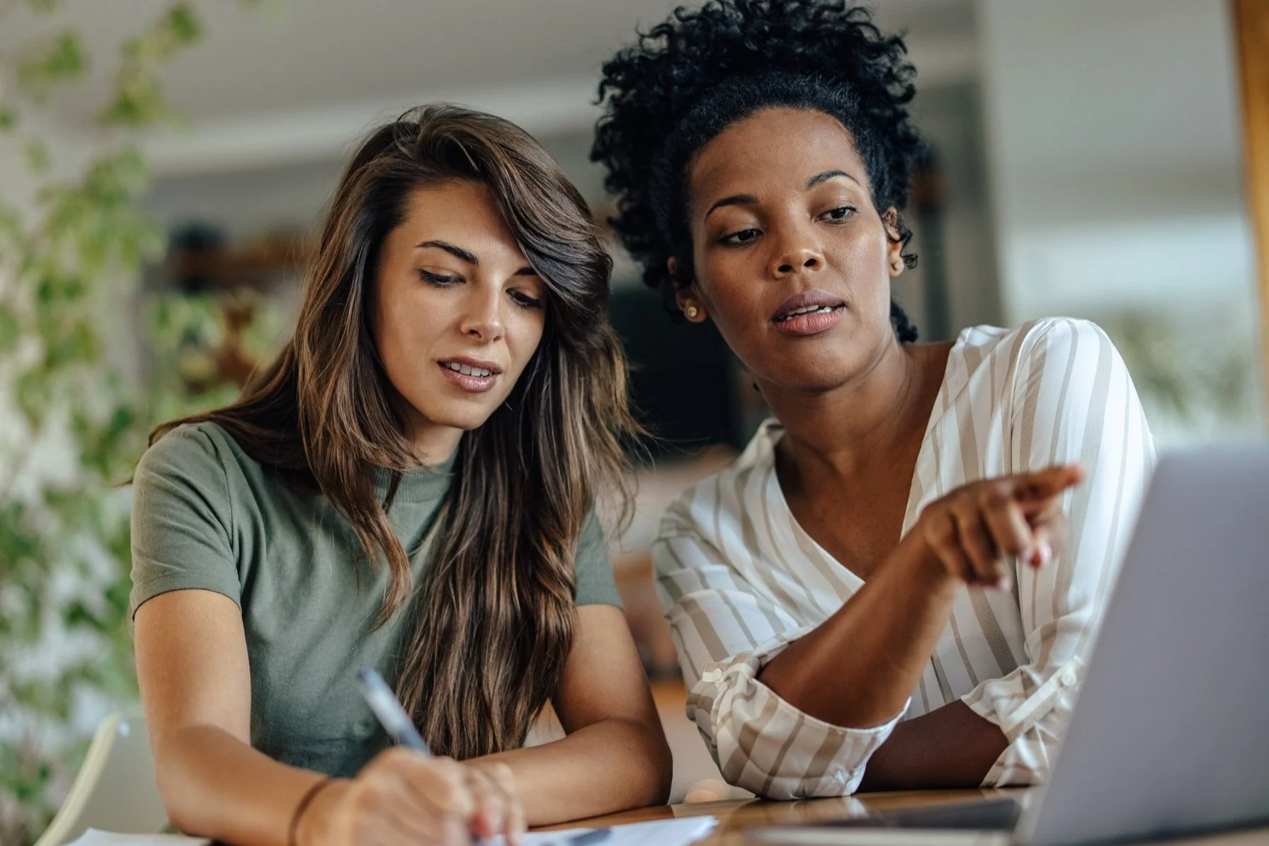 two women working on a project together