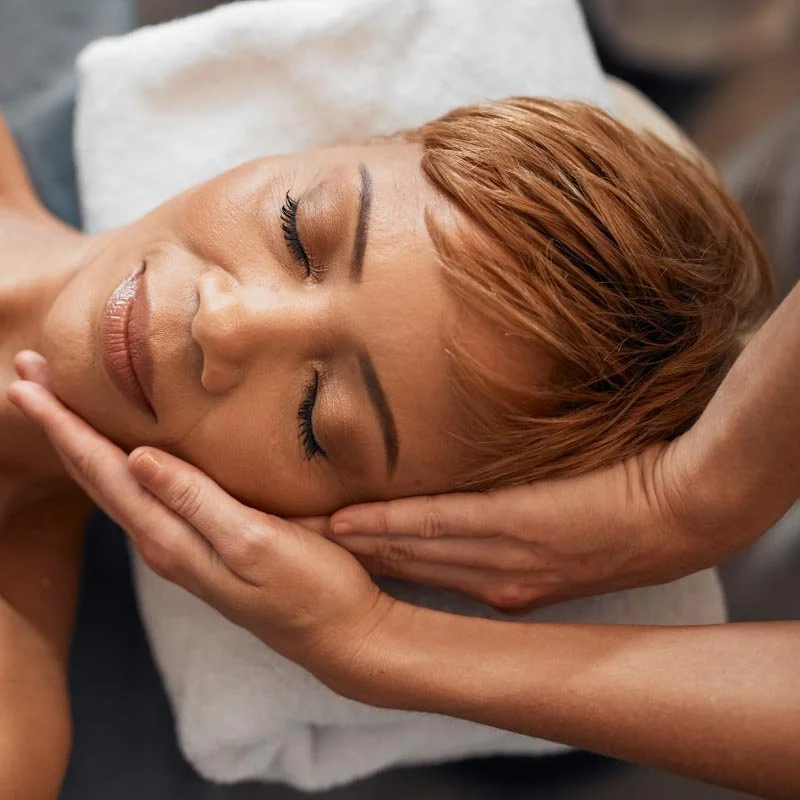 Woman receiving a facial massage