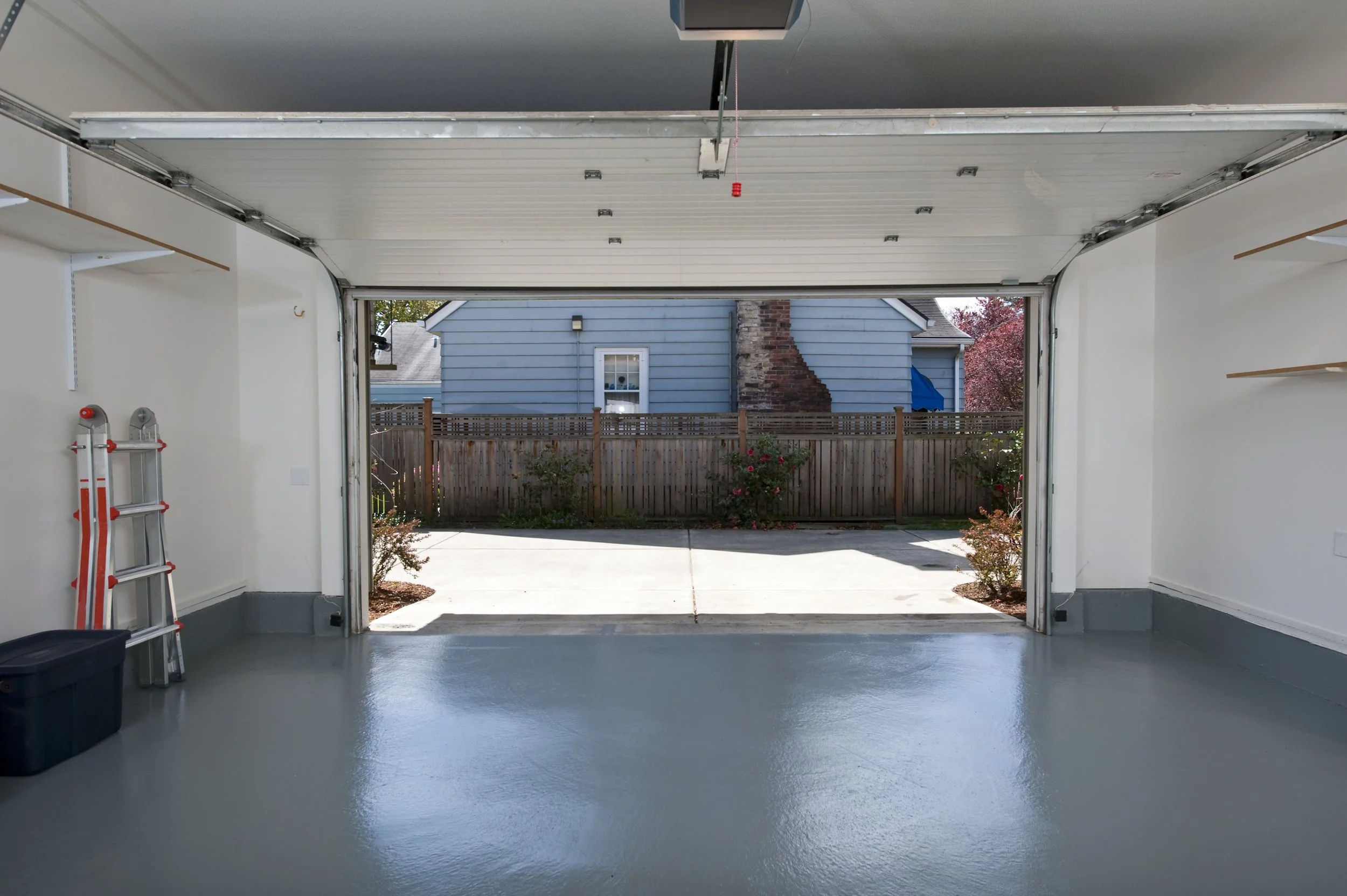 A picture of a garage after Twin Cities Cleanouts did a cleanout and junk removal. The space is organized, clean and inviting. The customer was happy that Twin Cities Cleanouts helped them reclaim their space!