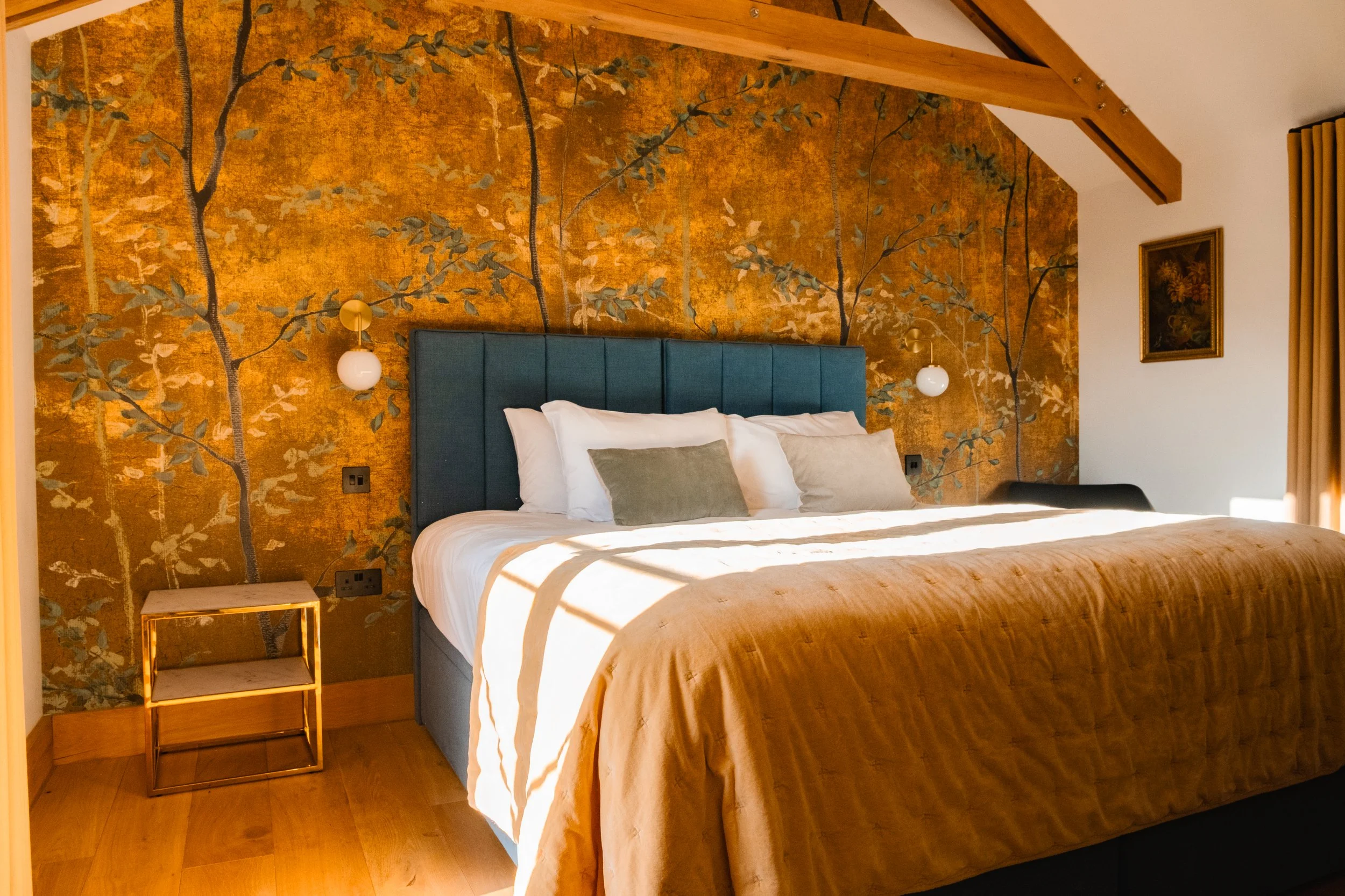 Wrapped in rich woodland tones and soft textures, the master bedroom feels deeply calm and cocooning. It is a space designed for slow mornings, long sleeps and complete escape.