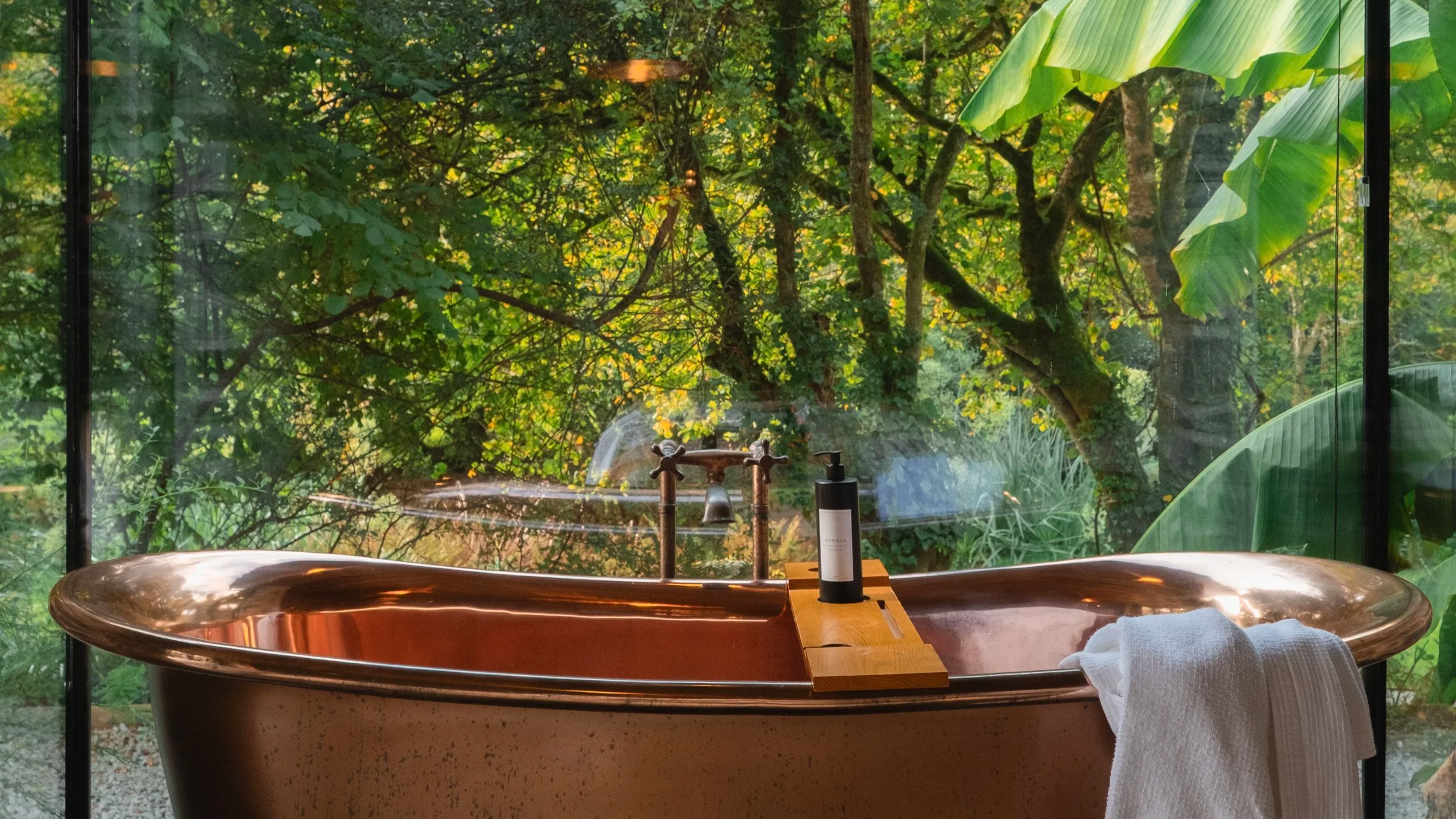 An invitation to slow everything down, this intimate bathing space is designed for long, lingering rituals, where warm water, candlelight and quiet moments take centre stage.