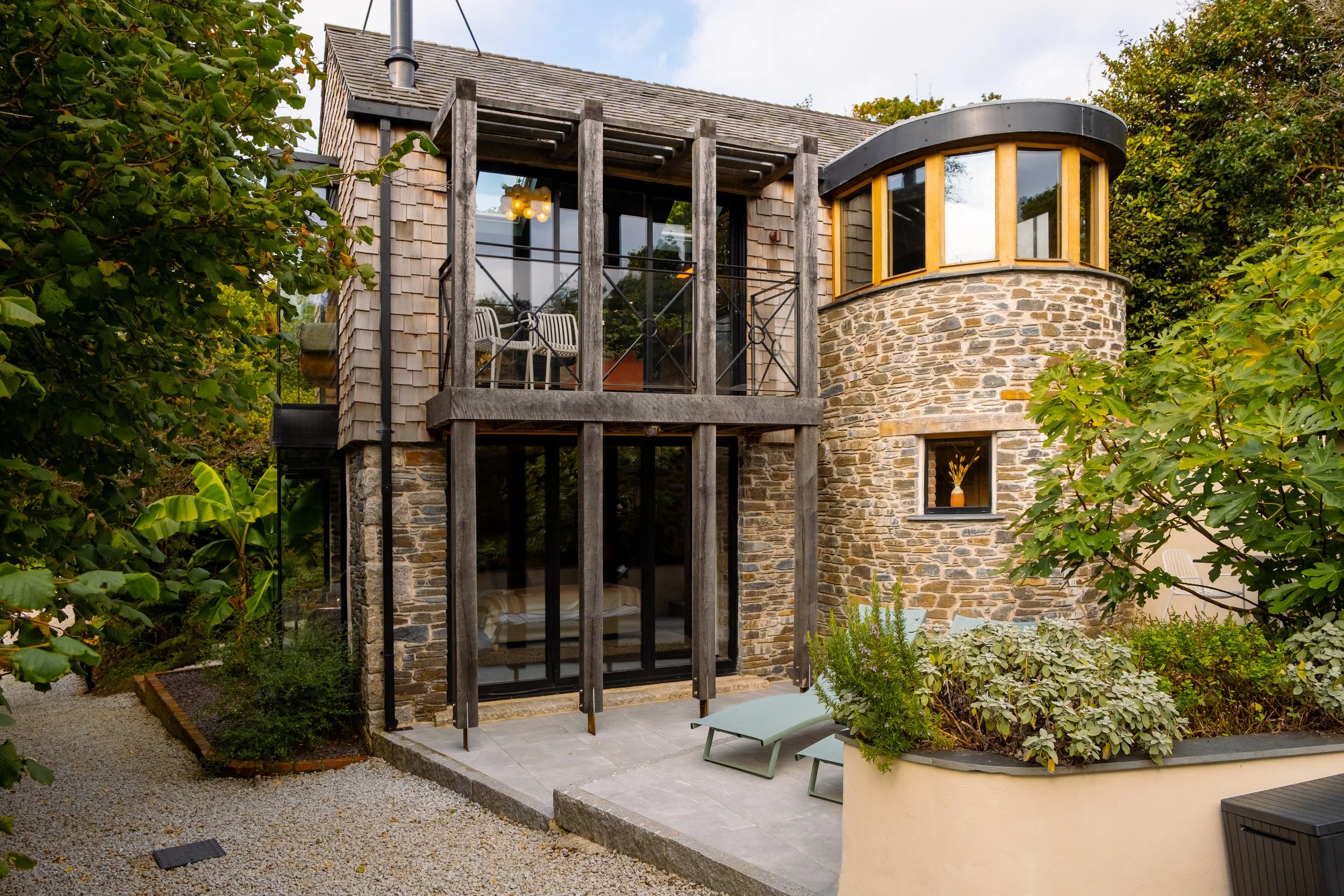 Set among ancient woodland, Lowartha’s striking architecture blends seamlessly with its natural surroundings, creating a secluded retreat designed for privacy, stillness and escape.