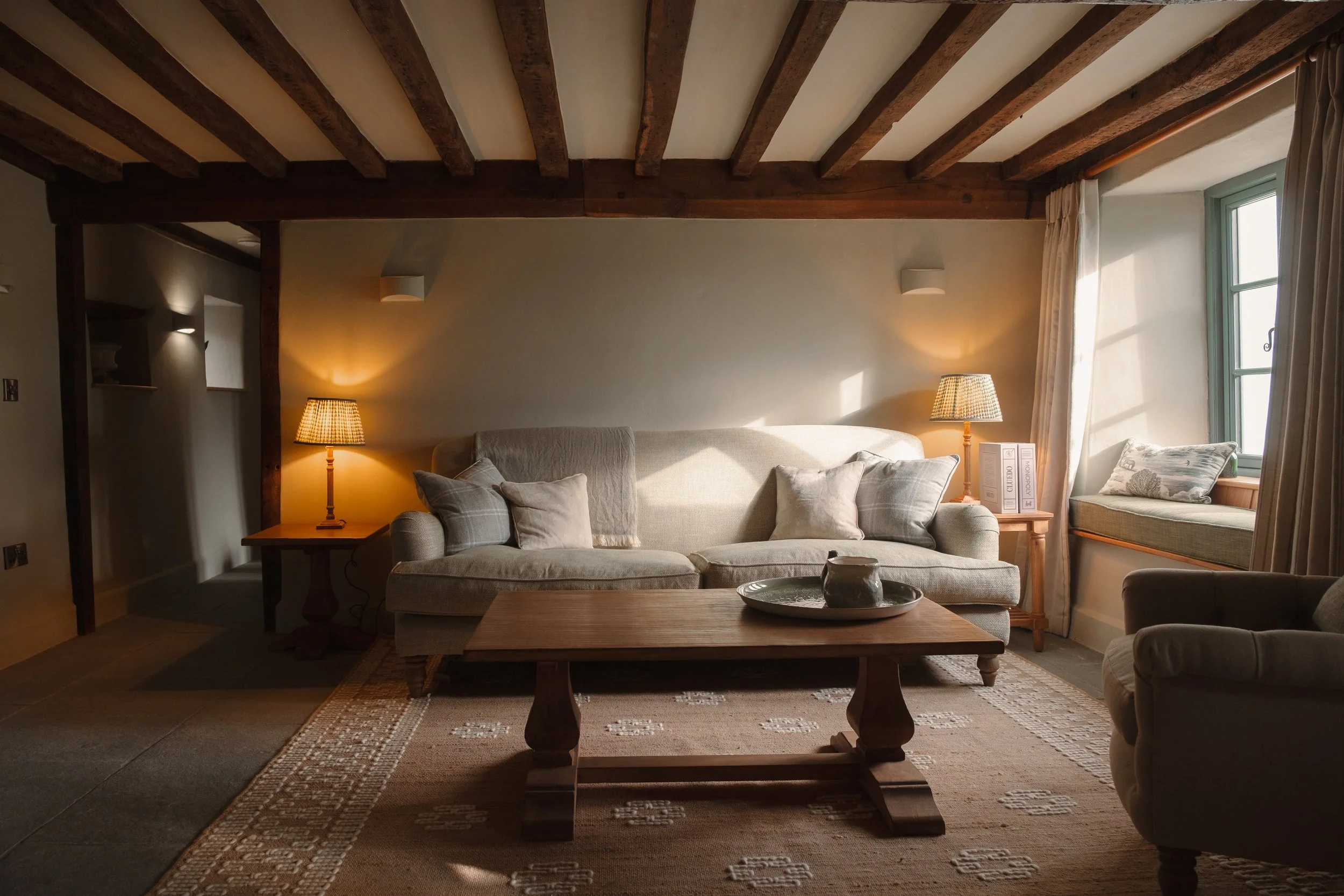 Generous seating and warm lighting create a calm, cocooning space to truly unwind.