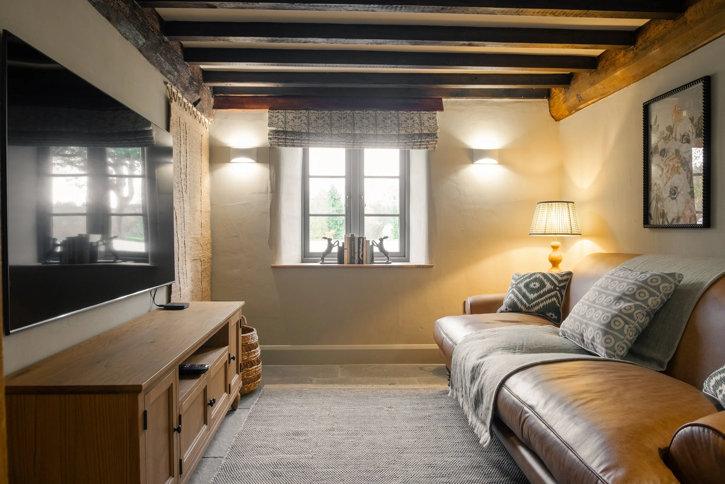 Escape to the tucked-away TV snug for relaxed evenings and laid-back lounging.