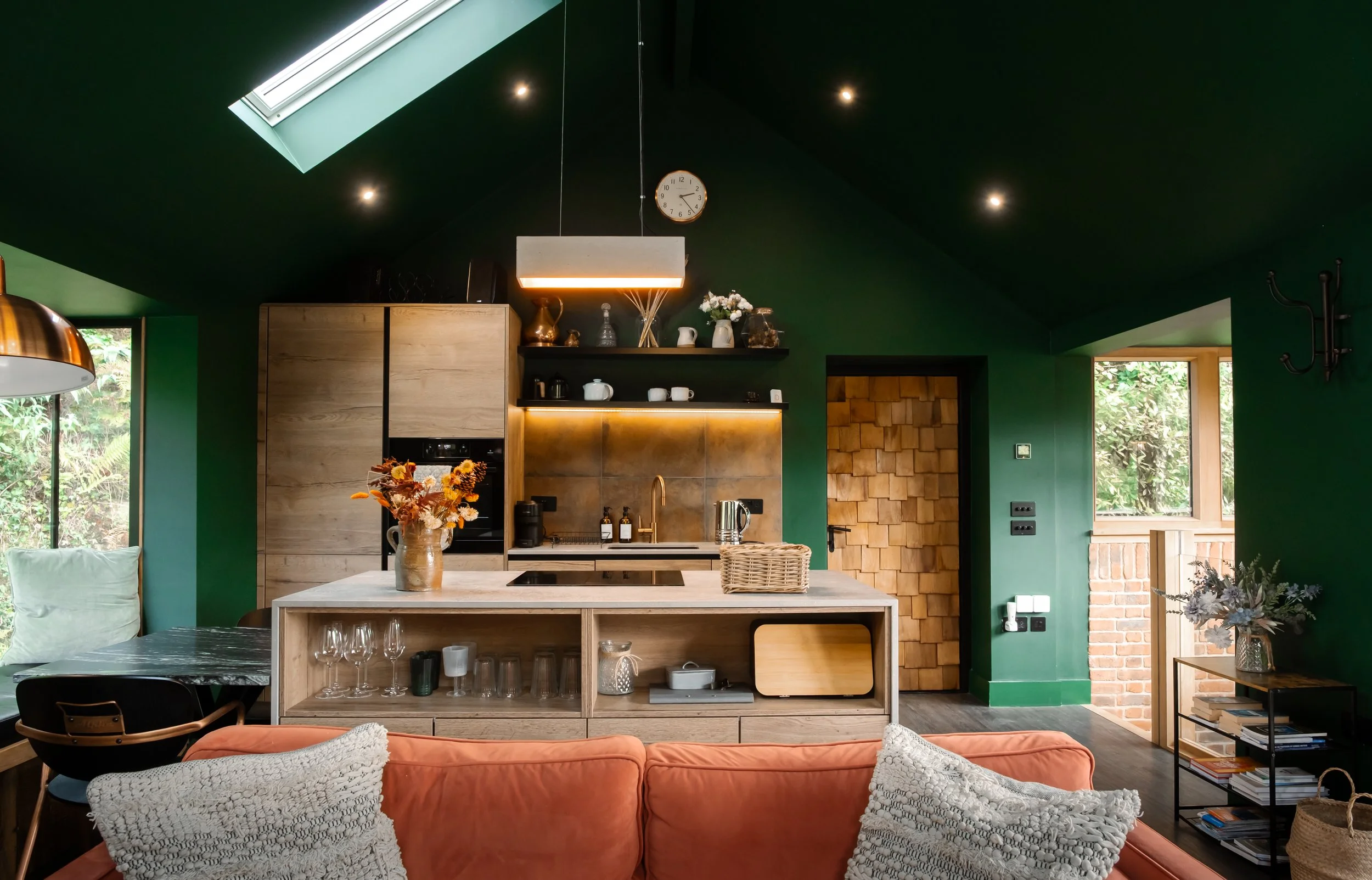 The heart of the house opens into a calm, social space, designed for shared cooking and long, unhurried meals together.