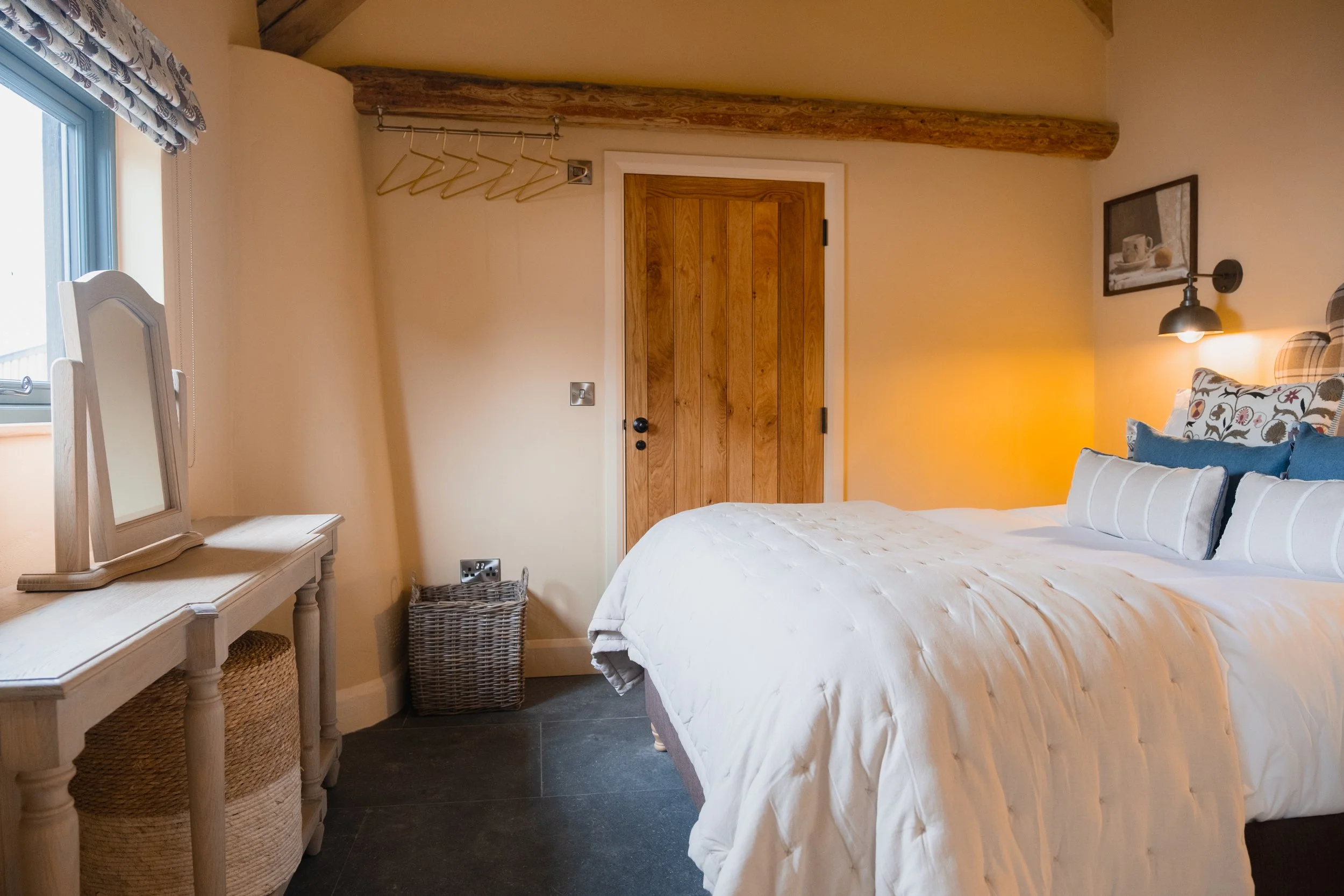 Sink into layered textures, warm tones, and the kind of quiet that lingers