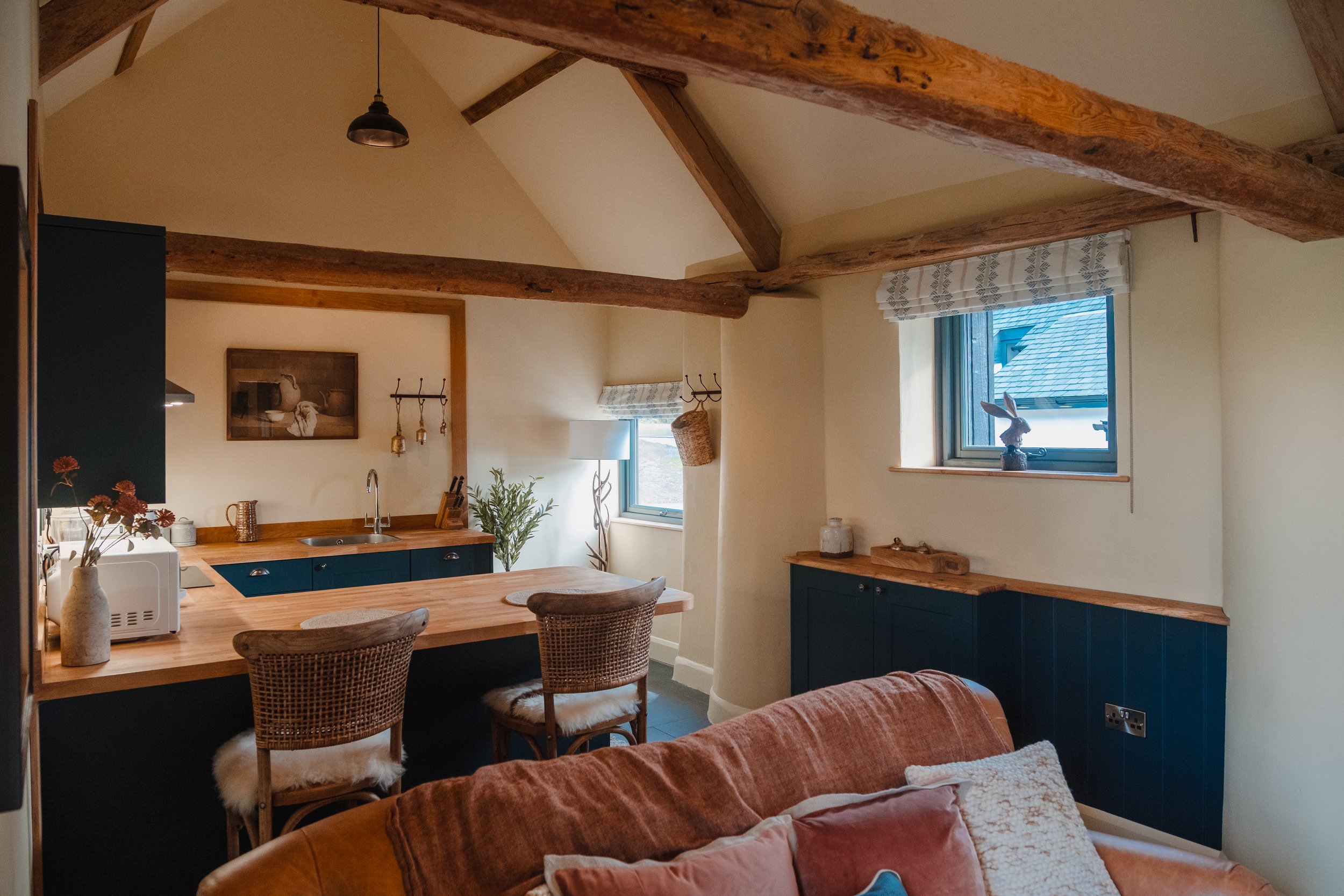 Morning begins here - warm coffee, sheepskin throws, and quiet moments before the world wakes.