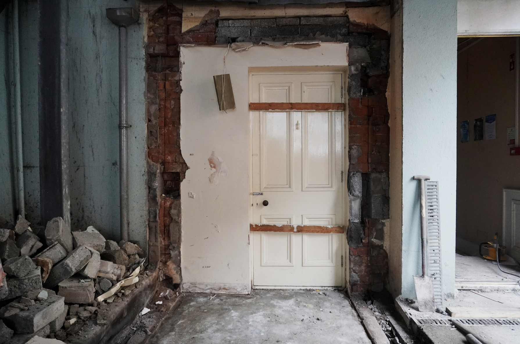 Old doorway upstairs, now the seating area opposite the bar of The Drawing Room