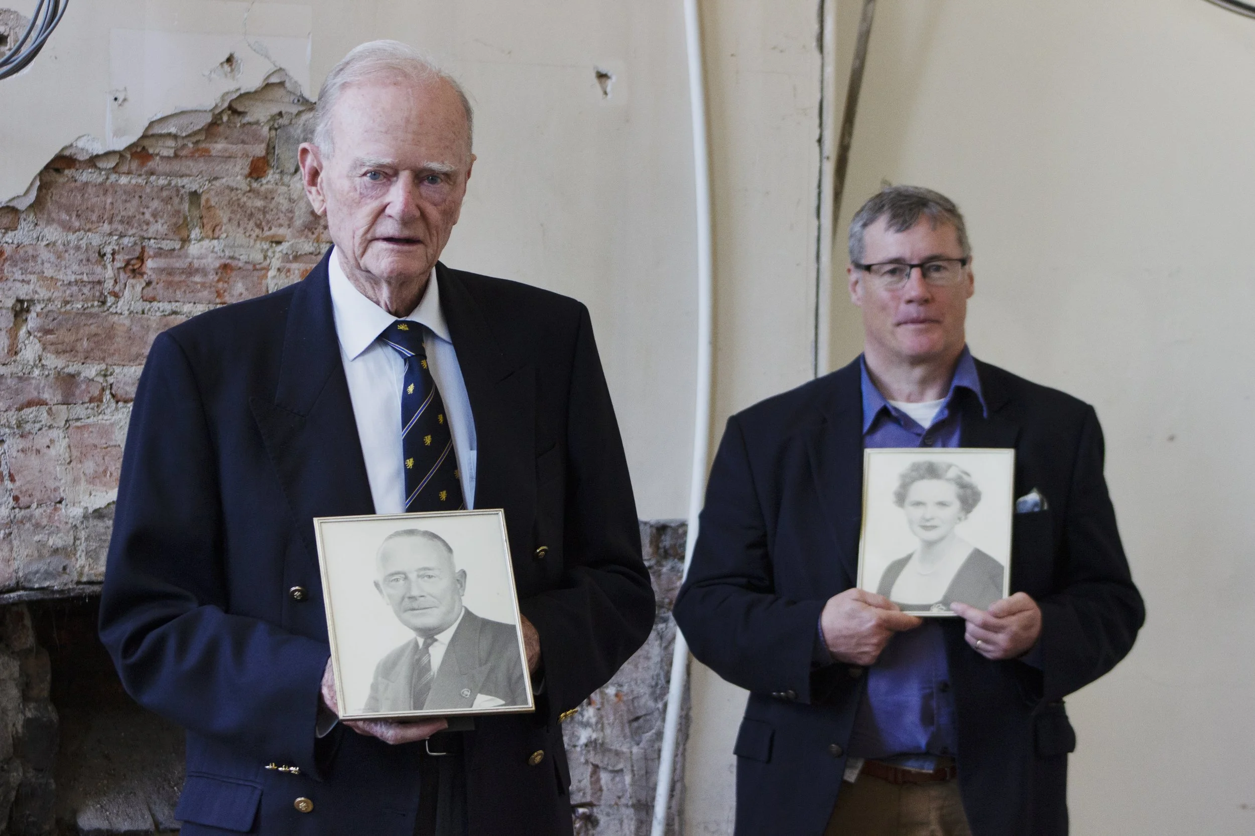 Peter Osborough and Robert Lyle standing in the old dining room - now the Open Arms Bar